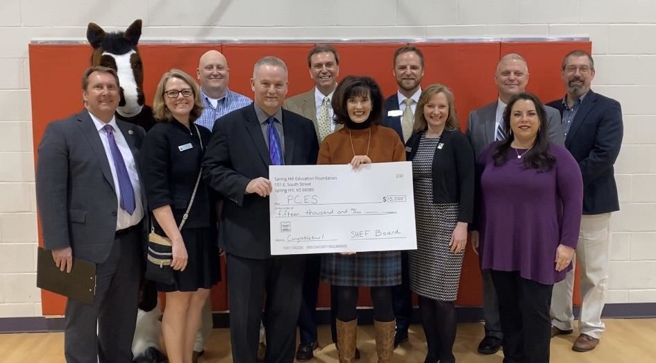  Group receiving a grant check